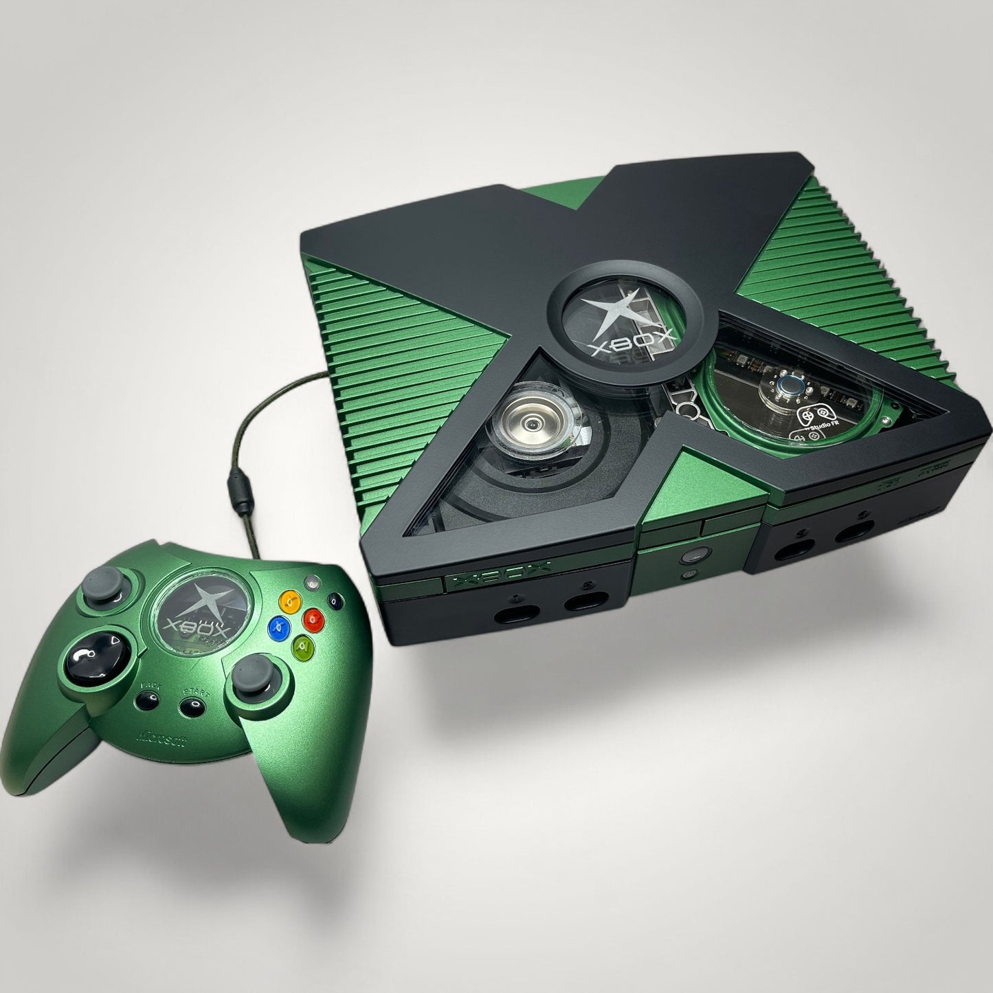 StudioFR custom black and green Xbox Original console with window mod and RGB lighting, includes matching controller.