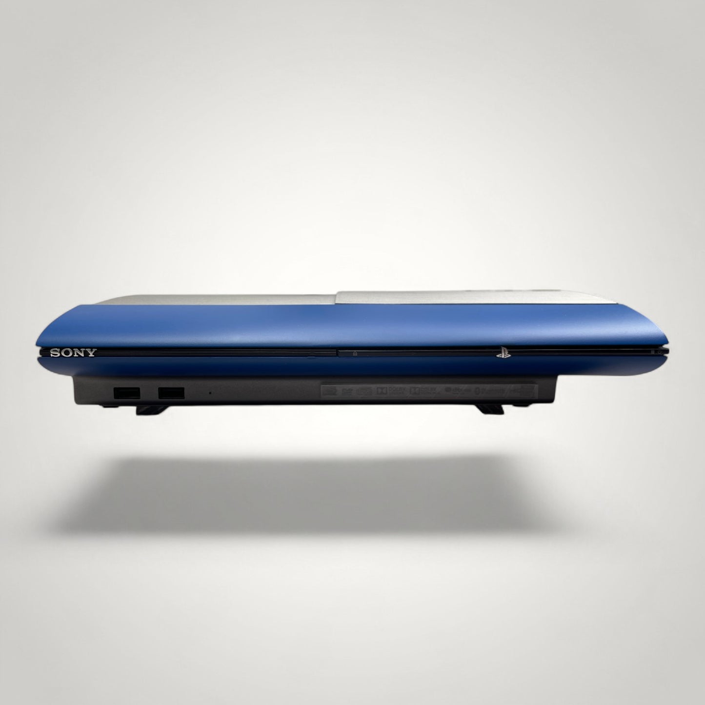 StudioFR custom blue and steel PS3 Super Slim console with brushed steel accents and a blue finish.