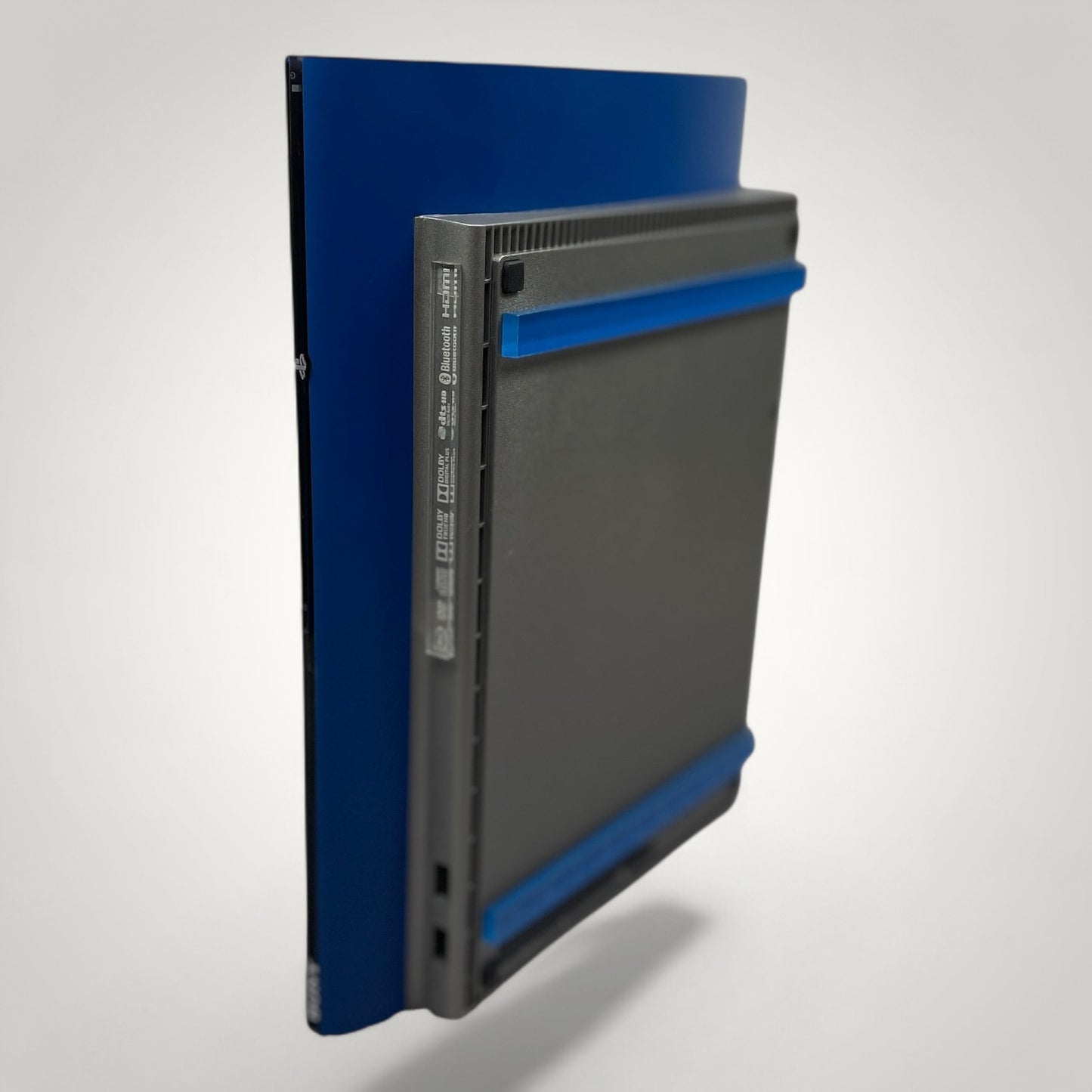 StudioFR customized steel and blue PS3 Super Slim console with blue accents. Brushed steel finish.