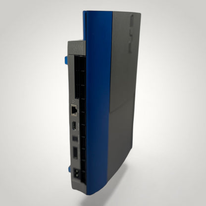 StudioFR customized steel and blue PS3 Super Slim console with ports visible on the side.