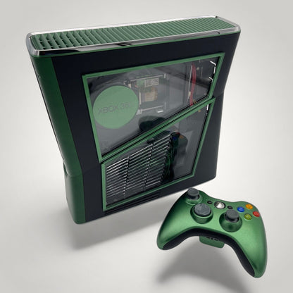 StudioFR custom black and green Xbox 360 Slim console with window mod and matching controller.