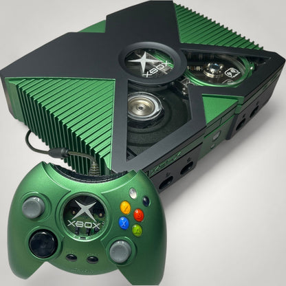 StudioFR custom black and green Xbox Original console with window mod and matching controller. Features RGB lighting and HDD upgrade.