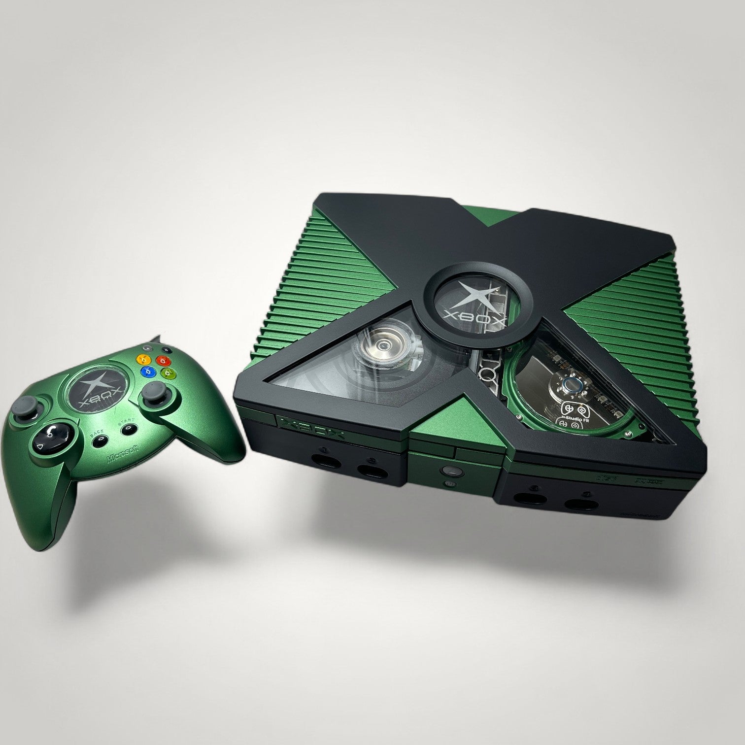 StudioFR custom black and green Xbox Original console with window mod, RGB lighting, and matching controller. HDD mod included.